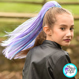 Playful Girl Wearing Kids Blue & Raspberry Purple Ponytail Hair Extensions