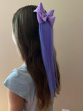 Girl wearing Straight Kids Blue & Purple Hair Extensions with Purple Bow