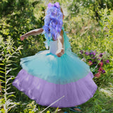 Girl Wearing Kids Blue & Purple Hair Extensions with Purple Bow & Matching Dress