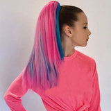 Young girl wearing cotton candy pink and teal colorful hair extensions