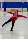 Girl ice skating with pink and purple hair extension