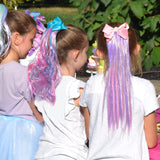 Girls wearing  My Hair Popz extensions at a girls birthday party