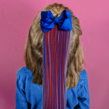 Mini Red White Blue bow hair extension on short hair with blue bow