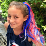 Girl wearing red white blue hair extension ponytail for little kids