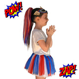 Girl wearing red, white & blue super hero hair extensions 