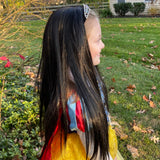 Little girl wearing black princess tiara wig & costume