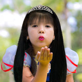 Girl wearing black princess wig with tiara dress-up