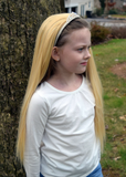 Girl wearing blonde princess Cinderella costume wig with tiara